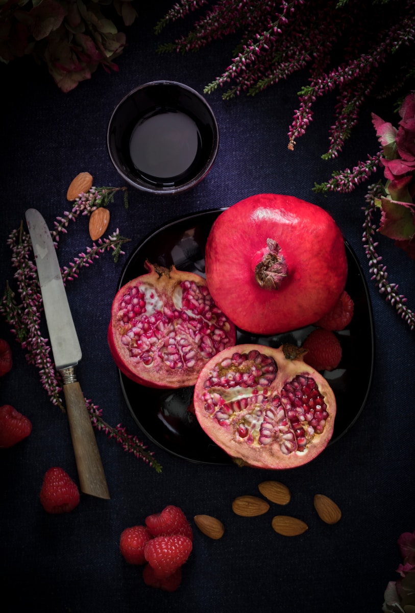 red fruit on black plate